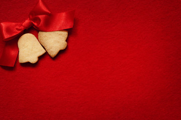 Christmas abstract  background  with cookies on red fabric - obrazy, fototapety, plakaty