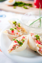 Delicious conchiglie pasta with tuna