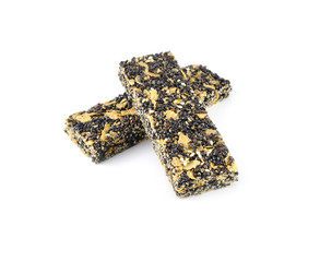 Honey bars with black sesame seeds isolated on white