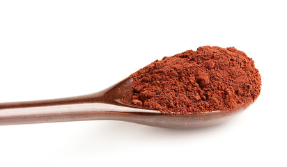 Cocoa in a ceramic spoon.