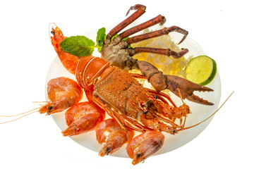 Spiny lobster, shrimps, crab legs  and rice