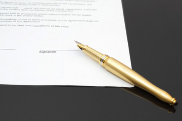 signing contract with fountain pen