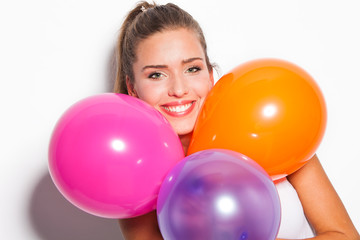 smiling girl and balloons