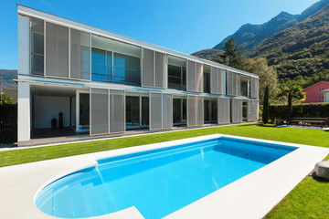 Modern villa with pool, view from the garden