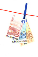 banknoty euro suszące się na lince - obrazy, fototapety, plakaty