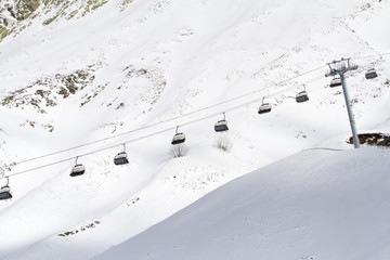 ski lift chairs in the mountains