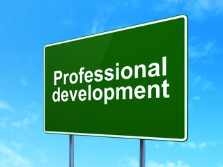 Education concept: Professional Development on road sign