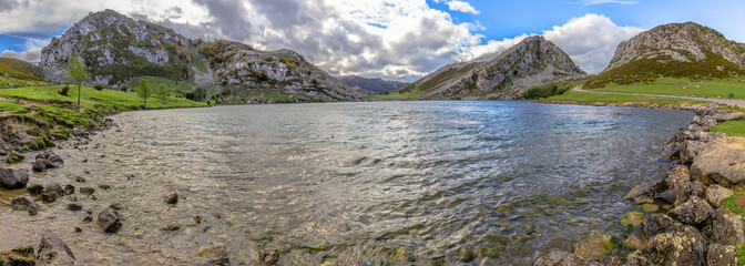 Fototapeta na wymiar Panoramic of the Enol lake from water level in Asturias, Spain