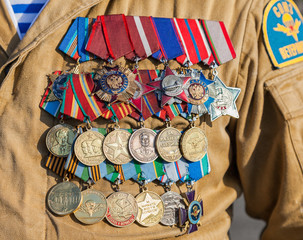 Different awards and medals on the russian military uniform