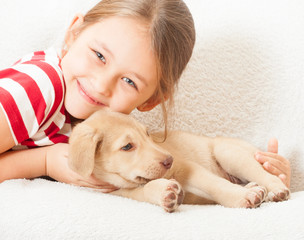 girl with a cute puppy