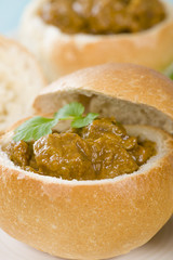 Bunny Chow - South African mutton curry inside a bread bun