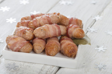 Pigs in Blankets - Sausages wrapped in bacon.