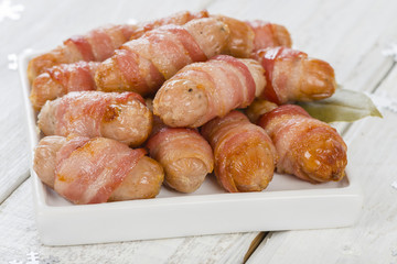 Pigs in Blankets - Sausages wrapped in bacon.