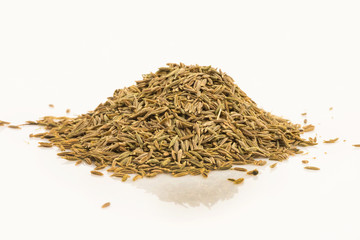 Dried caraway fruits (often termed caraway seeds)
