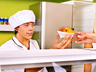 Male wearing chef uniform.