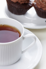 Drink tea with cupcakes a