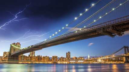 Fototapeta premium Brooklyn, New York. Night colors with storm over main city landm