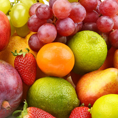 Naklejka na ściany i meble Multicolored background of fruits and berries