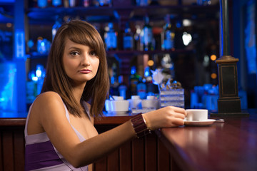 woman with a cup of coffee