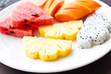fresh fruit on white plate
