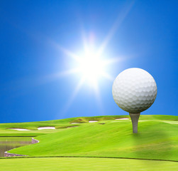 golf course with beautiful sky and sun
