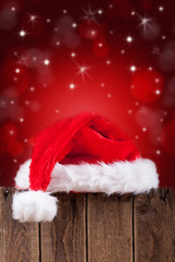 Obraz na płótnie Canvas Wunschzettel mit Weihnachtsmütze