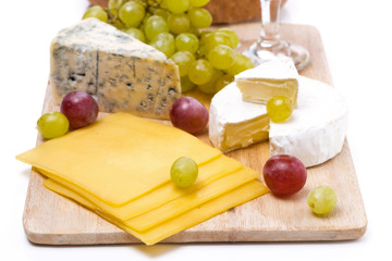 three kinds of cheese and grapes, close-up