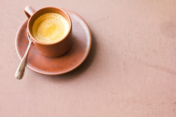 coffee on brown table background