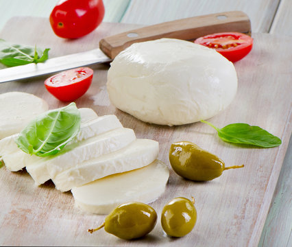 mozzarella with cherry tomatoes and basil.