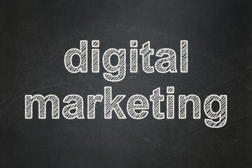 Advertising concept: Digital Marketing on chalkboard background