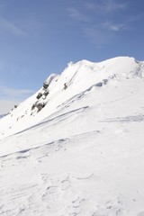 Fototapeta na wymiar Snowcapped mountain ridge