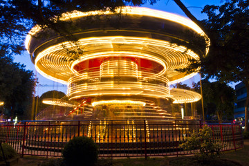 Merry-go-round carousel at night, Lignano Sabbiadoro, Italy