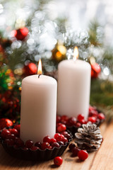 Obraz na płótnie Canvas Christmas decorations with a candles