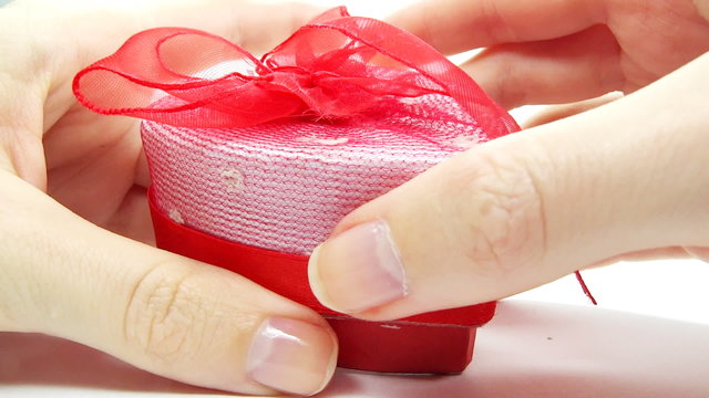 Jewelery emerald ring and earrings in red box as present