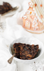 Pieces of Christmas Pudding in a bowl, copy space for your text