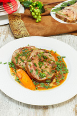 Meat  Roulade. Spiced Veal Roulade on festive table