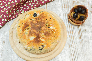 Focaccia bread with black olives.