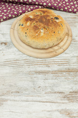Focaccia bread with black olives.