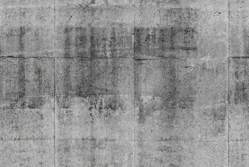 Gedetailleerde naadloze donkergrijze betonnen muur achtergrond