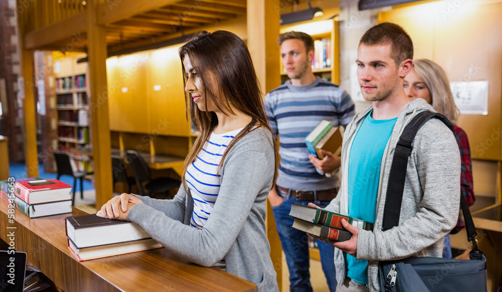 Poster Students in a row at the library counter