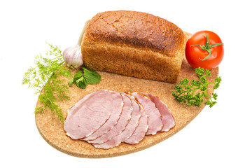 Ripe fresh ham with vegetables