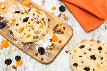 Fruit bread. Raw Fruit Stollen Dough Rising on cutting board.