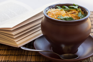 Roast with meat, potatoes in a clay pot