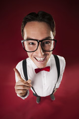 Funny nerdy man wearing big glasses