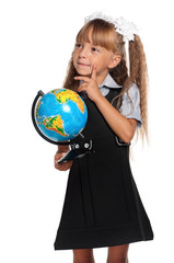 Little girl with globe