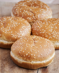 baked bread on wooden background