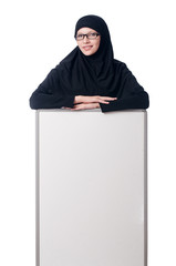 Muslim woman with blank board on white