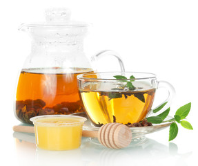 Teapot with mint tea and honey