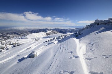 Fototapeta na wymiar Winter panorama of high mountain range