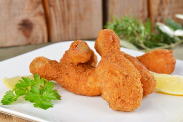 Fried chicken legs on a plate